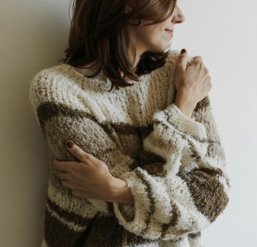 A moment of self-acceptance and warmth, representing the journey of embracing imperfection in teens.
